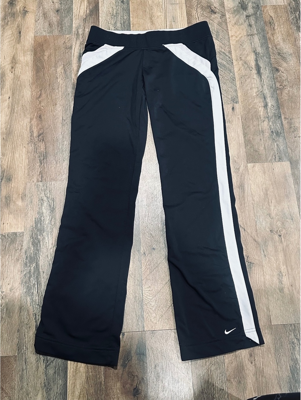 Nike black athletic pants with white side panels